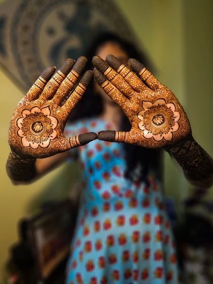 Another view of the personalized bridal mandalas. The symmetry and clean lines are achieved with my smooth-flowing henna paste.