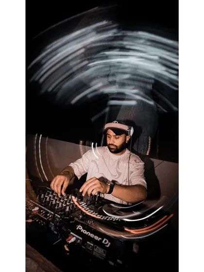Another creative motion-blur photo. This style captures the feeling of being lost in the music on a packed dance floor.