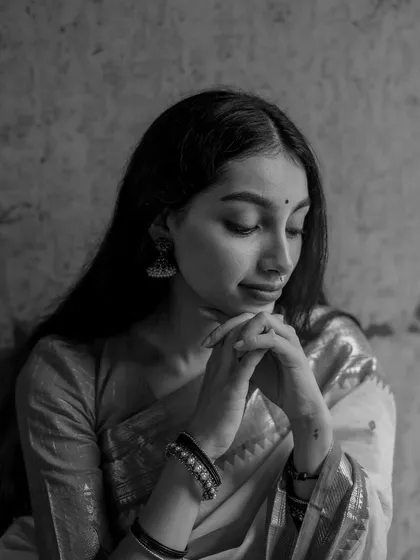 A quiet, black and white portrait. Removing the color often allows the emotion and the form to come through more strongly.