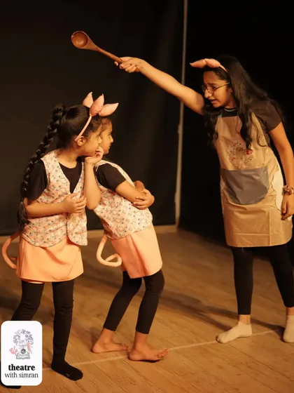A scene from our adaptation of "The Three Little Pigs," where Mother Pig gives her little ones some advice.