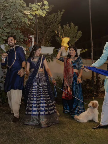 A fun moment from a Garba night, with the groom in a classic Gujarati kediya-dhoti ensemble. We love styling clients who embrace traditional attire and slay in the classics.