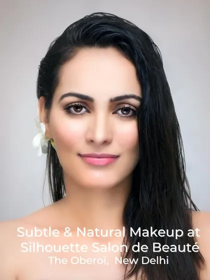 The essence of our philosophy is enhancing, not masking. This is our signature subtle and natural makeup, focusing on creating a dewy, luminous complexion with softly defined eyes and a neutral lip, perfect for an effortlessly polished look.