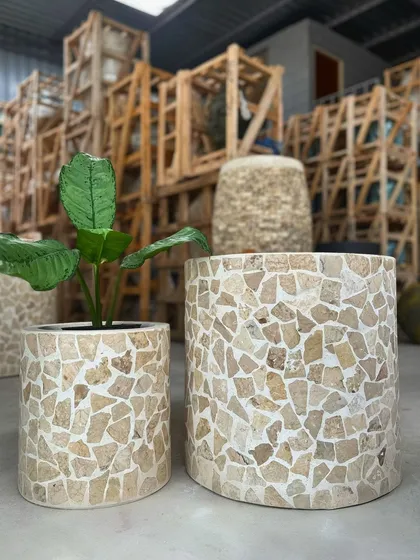 A special moment for my terrazzo planters. This pair of cylindrical pots features a beautiful mosaic of natural stone chips.