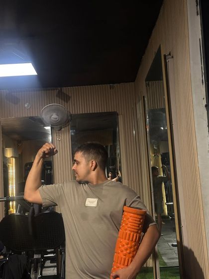 Using a foam roller for muscle recovery, an important part of any training regimen.