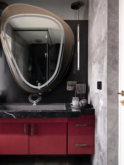 Another angle of the master bathroom, showcasing the custom vanity with its flushed sink and unique hardware. Every detail is crafted to create a cohesive and stylish design that flows with the master bedroom's bold concept.