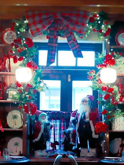A wider view of the beautifully decorated shelves and window display at Scarlett House.