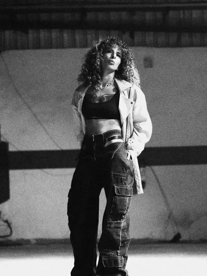 Your look is part of your story. This black and white shot captures the vibe I bring to my music and my brand. As a mentor, we'll work together to find and develop a style that is authentically you and connects with your audience.