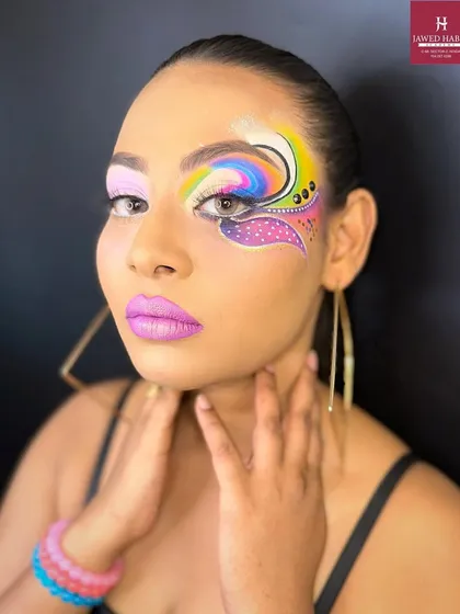 A direct look at the creative eye makeup, showing the precision and imagination that goes into our advanced classes.