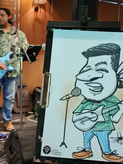 Here you can see the caricature I drew next to the musician who inspired it. It's fun to capture performers live in action.