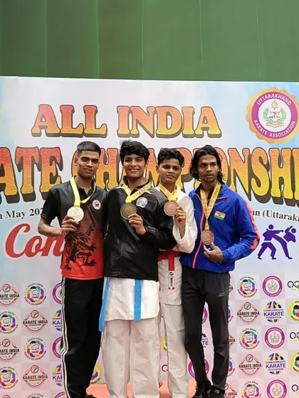 The U21 medalists on the podium at the All India Karate Championship, with Harshit taking the top spot.