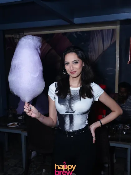 A guest with her cotton candy. This simple perk has become a beloved part of my Ladies' Night events.