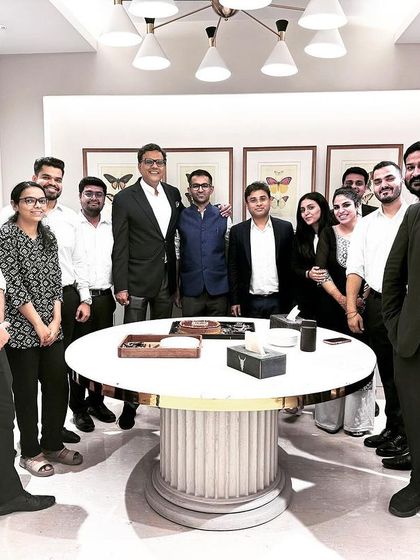 A group photograph with the team to commemorate Prabhav's birthday. These celebrations are a cherished tradition in our chambers.