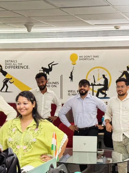 A group of employees participating in a desk-based yoga session. It's great to see teams embracing wellness and taking a break to move their bodies.