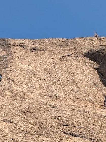 Multiple parties of climbers enjoying the vast expanse of slab at Talai Betta. There's room for everyone on these big walls.
