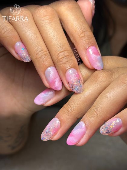 A full view of the dreamy pink watercolor and glitter nail set, perfect for a soft and playful look.