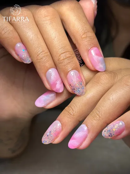 A full view of the dreamy pink watercolor and glitter nail set, perfect for a soft and playful look.