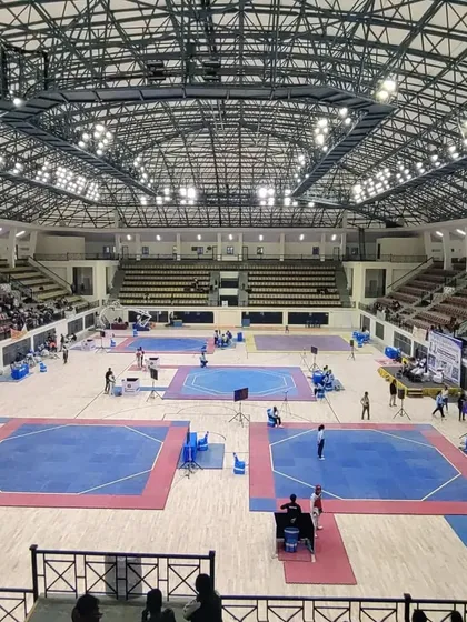 The impressive view of the Junior National Taekwondo Championship setup at Koramangala Indoor Stadium. We host and compete in top-tier events.
