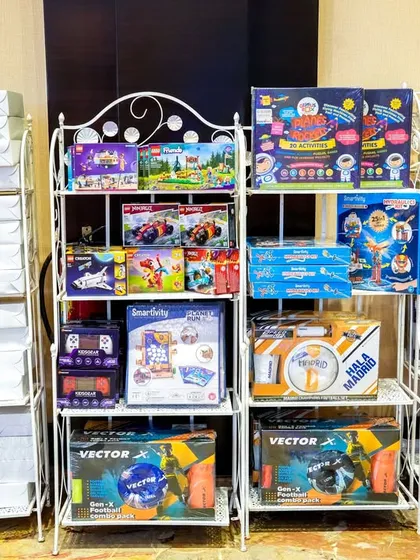 A selection of space-themed return gifts and toys for party guests.