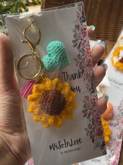 A single packaged sunflower keychain for the "#VisoInLove" wedding. It’s an honor to be a small part of our customers' big moments.