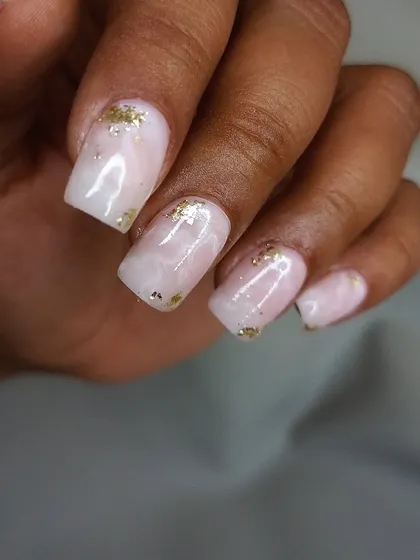 A soft pink quartz marble design with delicate gold foil flakes for a touch of luxury.