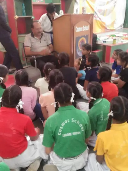 Mr. Ramesh Bansal Ji speaking to a group of schoolgirls about the importance of self-defense. We focus on providing practical advice and building confidence.