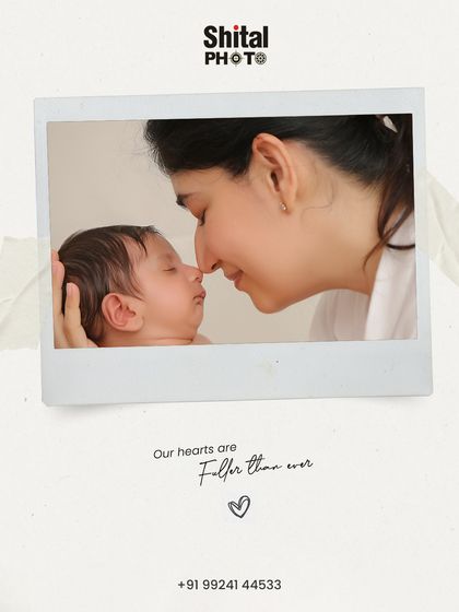 A sweet moment between mother and child, framed like a nostalgic polaroid. The gentle nose-to-nose touch speaks volumes about their instant connection.
