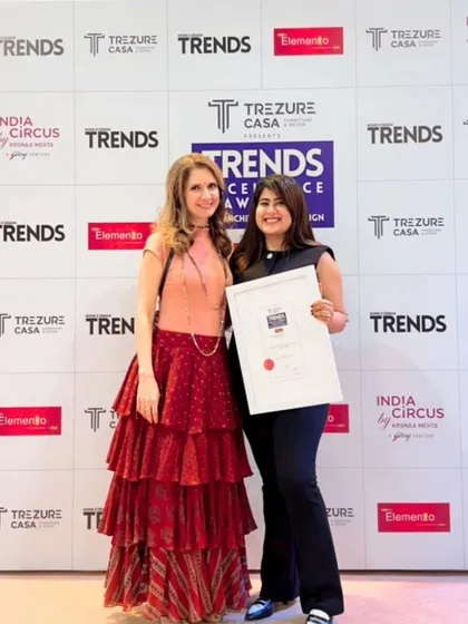 Ritika Rakhiani pictured at the TRENDS Excellence Awards, holding the commendation for the "Plug & Play" project. A proud moment recognizing our work in reimagining healthcare environments.