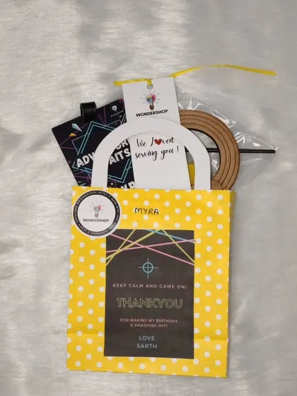 A beautifully assembled return gift bag, ready to be handed out to a happy guest. We take care of the sourcing, personalization, and packaging to make it easy for you.