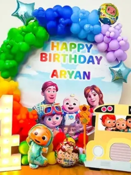 For the little ones, I bring their favorite characters to life. This Cocomelon themed birthday setup features a custom backdrop, a vibrant rainbow balloon arch, character cutouts, and a large light-up marquee number to make the birthday boy or girl feel extra special.