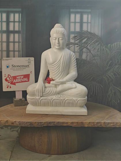 The clean lines and smooth finish of this 2.5-foot marble Buddha statue make it a beautiful addition to any spiritual or decorative space.