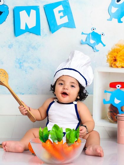 This little chef is very serious about his vegetables. The setup is perfect for capturing those focused and funny expressions.