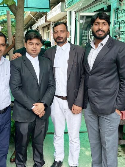 Posing with new and senior advocates. Mentorship and camaraderie are the pillars of our legal community.