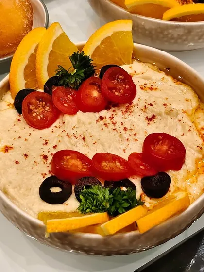 Silky smooth hummus paired with the zesty vibrance of citrus. This platter balances earthy richness with refreshing brightness in every dip.