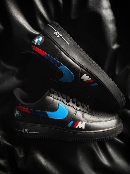 A top-down view of the BMW custom sneakers, showing the sleek design on the black leather.