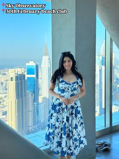 A look I wore to the Sky Observatory in Dubai. This blue and white floral dress was perfect for the stunning city views.