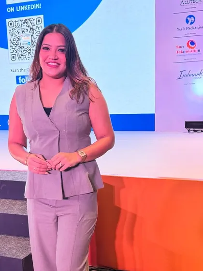 A confident pose on the stage of the Pharma Packaging & Labelling Conclave.