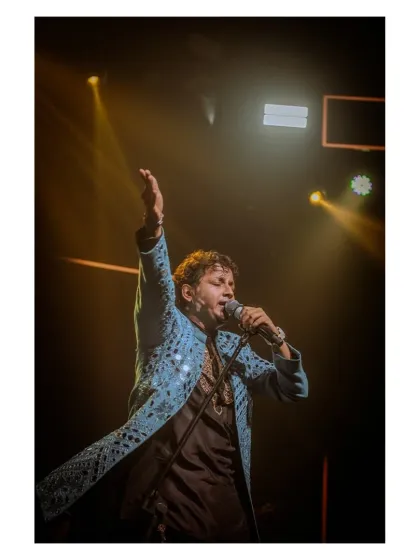 Our lead vocalist, commanding the stage at the JW Marriott for Berger Paints.