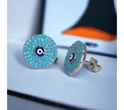 Add a touch of texture and color with these turquoise-studded Evil Eye earrings. The tiny turquoise stones create a beautiful mosaic around the central eye, all set in pure 925 silver.
