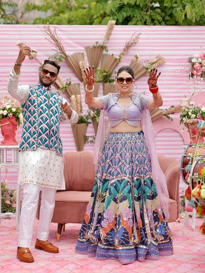 The couple shows off their dance moves at their vibrant Mehendi, a celebration full of energy and personal style.