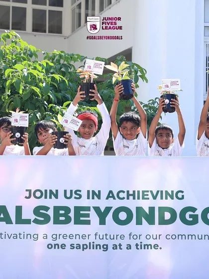My 'Goals Beyond Goals' initiative in action. I believe in using sports for social good, and at our youth leagues, every team participates in activities like planting saplings to cultivate a greener future for our community.
