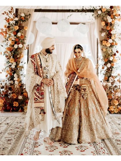 The best thing to hold onto in life is each other. This couple, in their beautiful wedding attire, is ready to hold on for a lifetime.