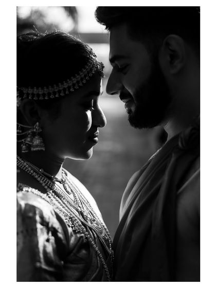 An intimate black and white silhouette of the couple. This close-up shot focuses on their connection, creating a powerful and artistic portrait that feels deeply personal.