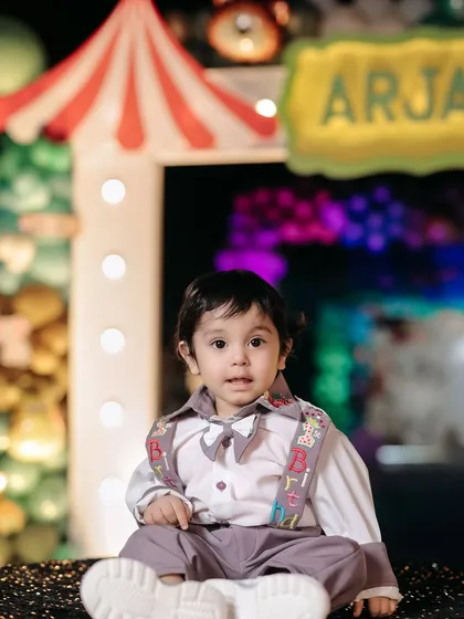 A curious and sweet expression from the birthday boy. I make sure to get a variety of shots during parties, from wide action shots to intimate portraits like this.