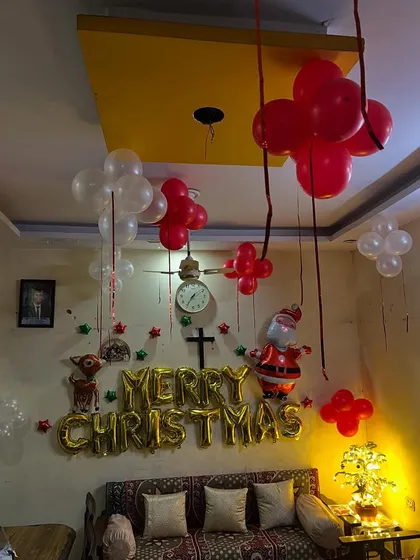 Another angle showing the ceiling balloons and festive wall decor.