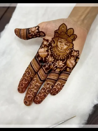 For me, mehendi is also a spiritual expression. I was so honored to create this intricate Shreenathji portrait, surrounded by delicate lotus motifs, for a client who holds this image close to her heart.