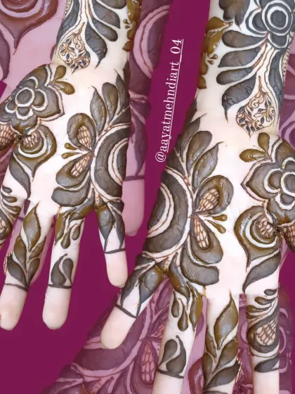 Another angle of the elegant Doha-style mehendi, showcasing the beautiful flow of the design across both hands.