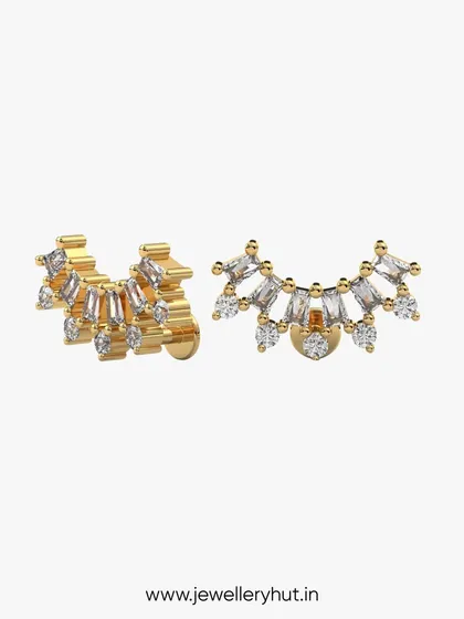 A unique pair of curved bar studs with baguette-cut stones, perfect for adding a touch of modern geometry to your ear stack.