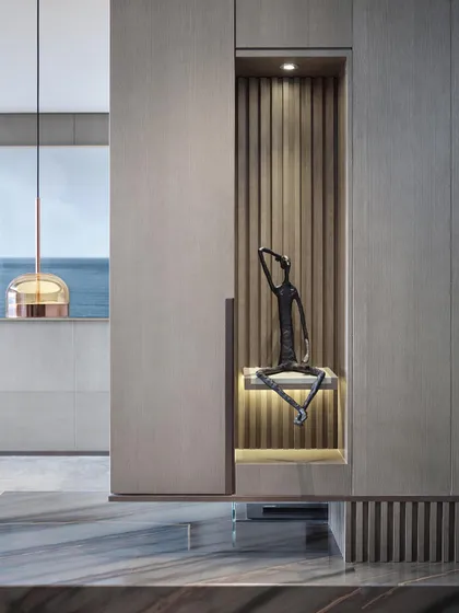 An artfully designed niche with integrated lighting provides the perfect display for a sculptural piece. This detail showcases our philosophy of designing the architecture itself to celebrate and enhance art.