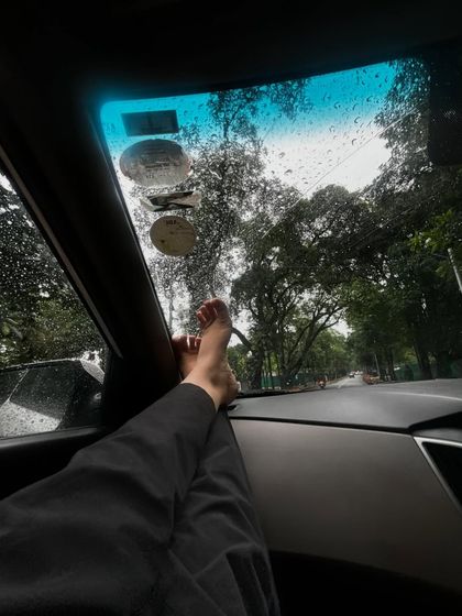 The perfect rainy day road trip view. This shot captures the cozy feeling of watching the rain from inside the car.