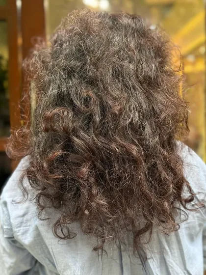 Before: This client's hair was ready for a refresh to bring back its vibrancy and shape.
